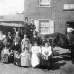 Gray family pose outside the Red Cow