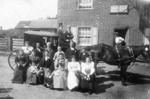 Gray family pose outside the Red Cow