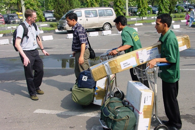 Frank in Nongkhai getting suitcases of clothes from Kheum and Big Sister, with Mac & Helen Sawyer