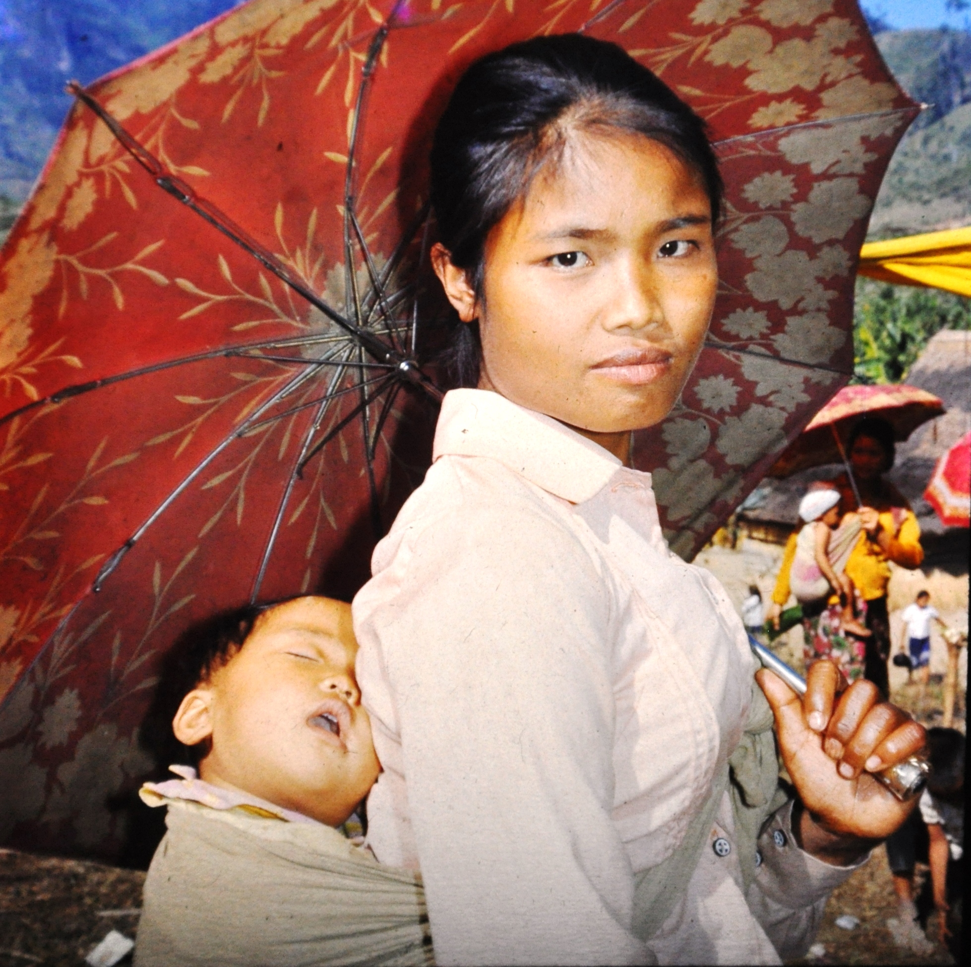 Khmu refugee lady with baby 1974