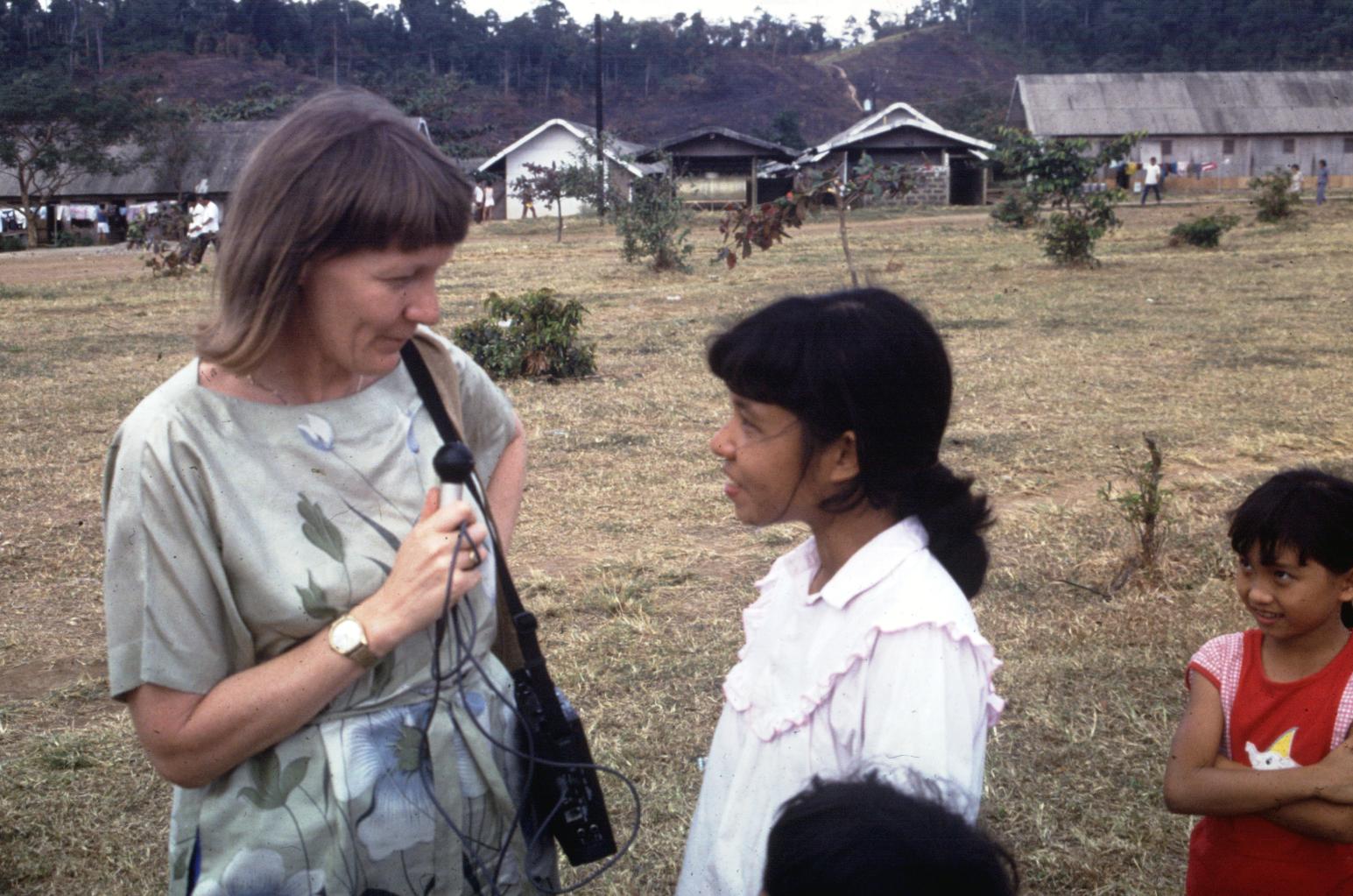 Anne Norris interviews Vietnamese refugee in camp